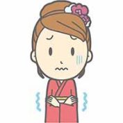 振袖で寒がる女性